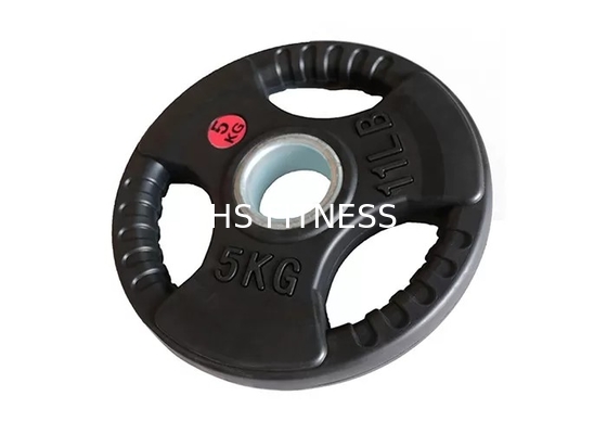 Los accesorios negros del entrenamiento del gimnasio fijaron la placa de goma del peso para el culturismo